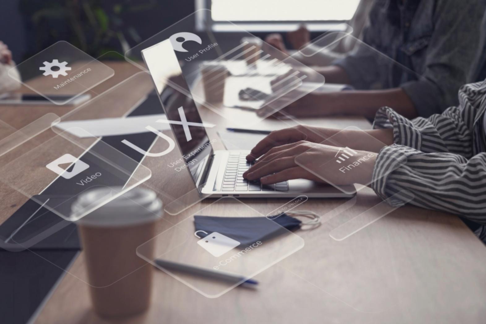 App support specialist analyzing performance metrics on multiple devices